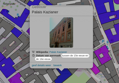 Screenshot of OpenStreetBrowser, with a map showing buildings and their age in colors. A popup on a "Palais Kazianer" is open. It shows the date when the building was completed in Dutch: "tussen de 15e eeuw en de 16e eeuw" (between 15th and 16th century).