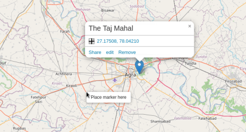 Screenshot with a marker with a popup (showing the custom text "The Taj Mahal", the coordinates and the interaction links) and the context menu "Place marker here"
